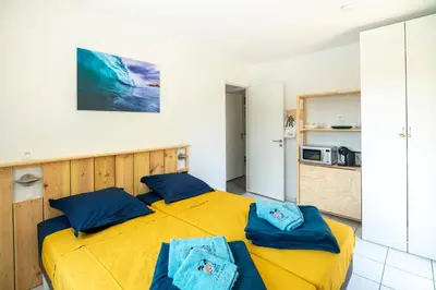 Cuisine ou kitchenette dans l'établissement un Air de Repos