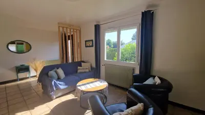 Coin salon dans l'établissement Maison proche du centre de La Hume Gujan-Mestras