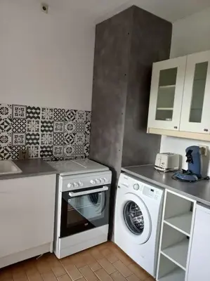 Cuisine ou kitchenette dans l'établissement Maison dans village de UZA 6P