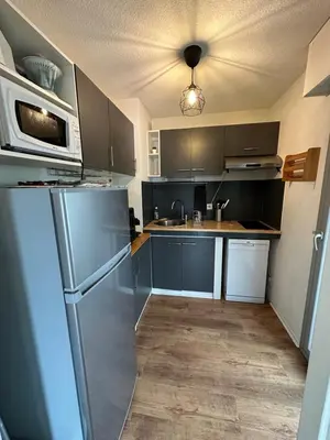 Cuisine ou kitchenette dans l'établissement Le Green des Halles Hossegor *T3*Parking*Clim