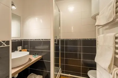Salle de bains dans l'établissement Studio plage de Capbreton avec terrasse