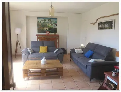 Coin salon dans l'établissement Villa de charme 
