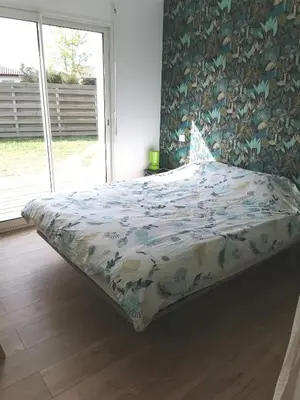 Un ou plusieurs lits dans un hébergement de l'établissement Villa en lisière de forêt