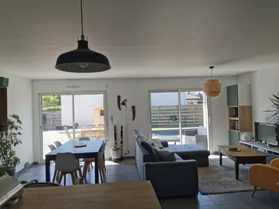 Coin salon dans l'établissement Villa en lisière de forêt