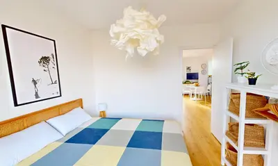 Un ou plusieurs lits dans un hébergement de l'établissement Sable - Appartement rénové pour 4 personnes
