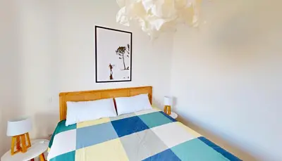 Un ou plusieurs lits dans un hébergement de l'établissement Sable - Appartement rénové pour 4 personnes