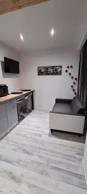 Cuisine ou kitchenette dans l'établissement Chalet avec Jacuzzi