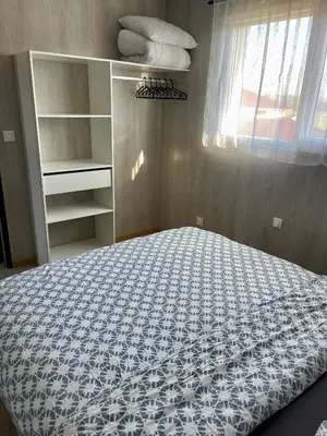 Un ou plusieurs lits dans un hébergement de l'établissement Appartement - location saisonnière