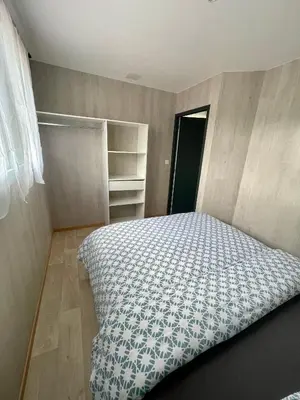 Un ou plusieurs lits dans un hébergement de l'établissement Appartement - location saisonnière