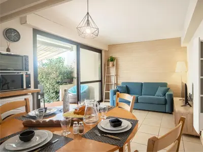 Coin salon dans l'établissement Apartment Palombe by Interhome