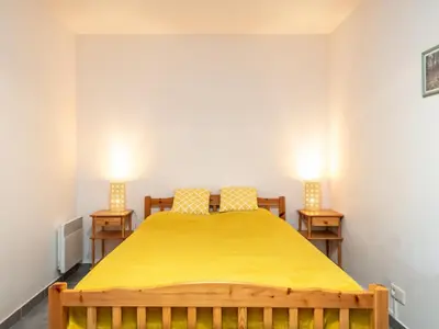 Un ou plusieurs lits dans un hébergement de l'établissement Apartment grand courlis by Interhome