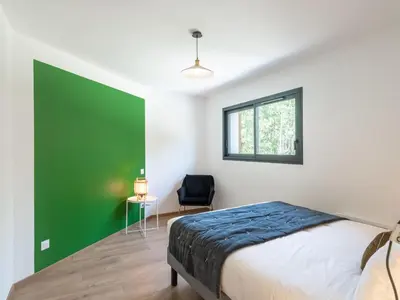 Un ou plusieurs lits dans un hébergement de l'établissement Holiday Home Ocean forest by Interhome