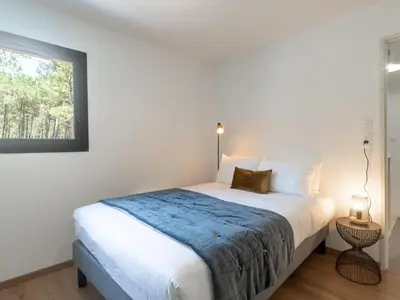Un ou plusieurs lits dans un hébergement de l'établissement Holiday Home Ocean forest by Interhome