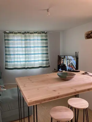Coin salon dans l'établissement Appartement cosy avec grande terrasse