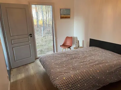 Un ou plusieurs lits dans un hébergement de l'établissement Maison proche du lac de Sanguinet et de Biscarrosse