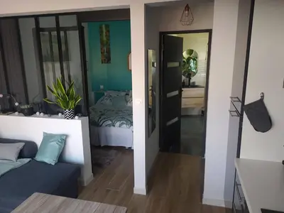 Télévision ou salle de divertissement dans l'établissement Maisonnette