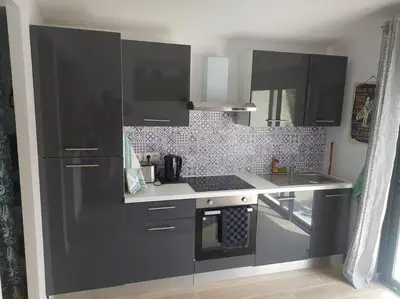 Cuisine ou kitchenette dans l'établissement Maisonnette