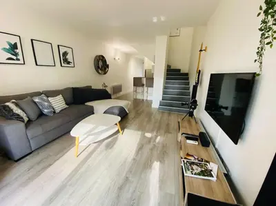 Télévision ou salle de divertissement dans l'établissement Le calme entre plage (700m) et golf! (Classé 3*)