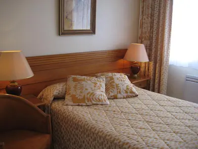 Un ou plusieurs lits dans un hébergement de l'établissement Hotel Bellevue de tradition familiale