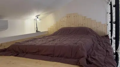 Un ou plusieurs lits dans un hébergement de l'établissement Gîte 4/6 personnes La mélodie du bonheur