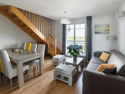 Coin salon dans l'établissement Apartment in Biscarosse near Sandy Beach