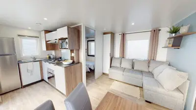 Cuisine ou kitchenette dans l'établissement Mobil home 4/6 personnes