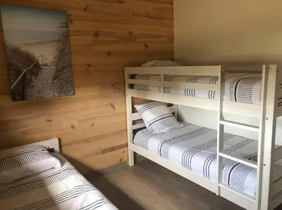 Un ou plusieurs lits dans un hébergement de l'établissement Chez Floflo