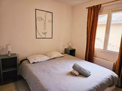 Un ou plusieurs lits dans un hébergement de l'établissement Agréable maison climatisée idéalement placée pour 6personnes vieux boucau