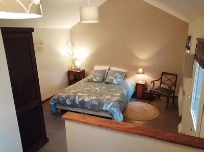 Un ou plusieurs lits dans un hébergement de l'établissement Grande maison entre Lac et forêt