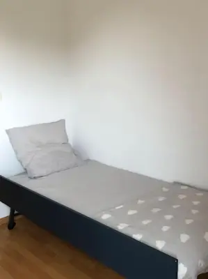 Un ou plusieurs lits dans un hébergement de l'établissement A deux pas du port, jolie maison redécorée
