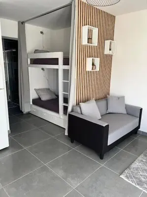Un ou plusieurs lits dans un hébergement de l'établissement Appartement à 15 min des plages