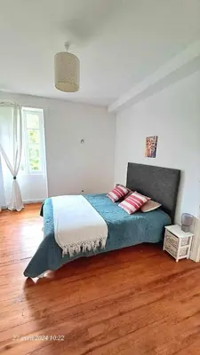 Un ou plusieurs lits dans un hébergement de l'établissement Domaine de Cachaou Logis du Pujeau sauna & spa piscine chauffée