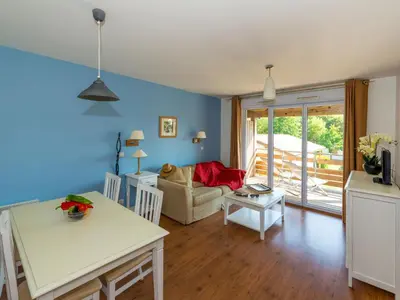 Coin salon dans l'établissement Holiday Home Les Cottages du Lac M4 Privilège by Interhome