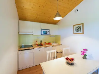 Cuisine ou kitchenette dans l'établissement Holiday Home Les Cottages du Lac M4 Privilège by Interhome