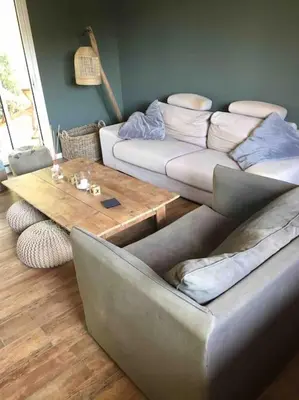 Coin salon dans l'établissement Maison cocooning proche plages