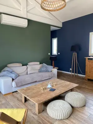 Coin salon dans l'établissement Maison cocooning proche plages