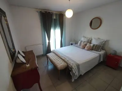 Un ou plusieurs lits dans un hébergement de l'établissement Appartement charmant à la Teste de Buch
