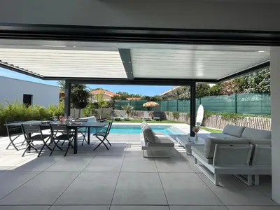 Piscine de l'établissement VILLA Grain De Sable PROCHE PLAGE, GOLF AVEC PISCINE ou située à proximité