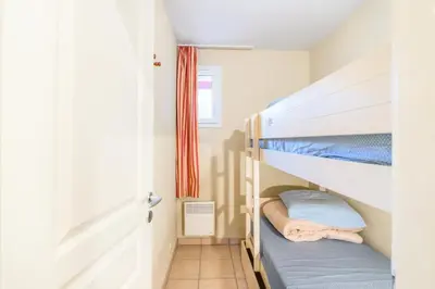 Un ou plusieurs lits dans un hébergement de l'établissement Village Moliets - maeva Home - 2 Pièces 6 Personnes Confort MAE-2186