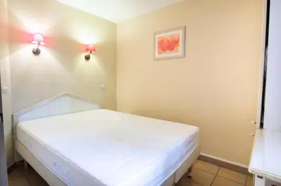 Un ou plusieurs lits dans un hébergement de l'établissement Village Moliets - maeva Home - 2 Pièces 5 Personnes Confort MAE-2172