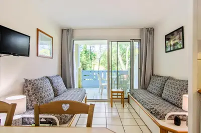 Coin salon dans l'établissement Village Moliets - maeva Home - Appartement 2 Pièces 5 Personnes Confort MAE-4322