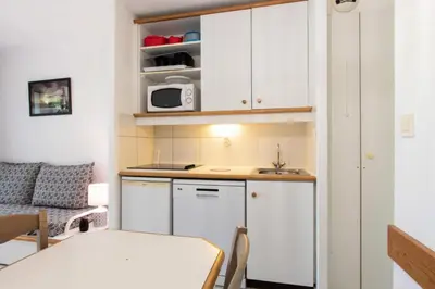 Cuisine ou kitchenette dans l'établissement Village Moliets - maeva Home - Appartement 2 Pièces 5 Personnes Confort MAE-4322
