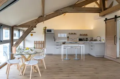 Cuisine ou kitchenette dans l'établissement L'Aparté