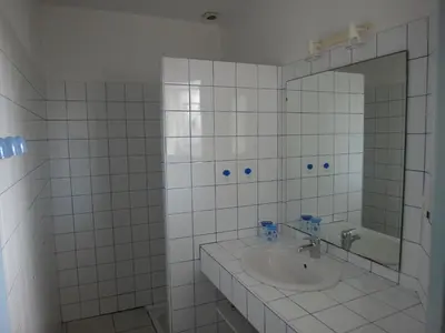Salle de bains dans l'établissement Orée de La Dune