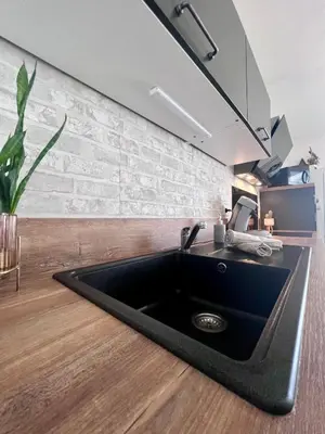 Cuisine ou kitchenette dans l'établissement Casa Del Sol - T2 au Cœur du BassinPort Teich 5'