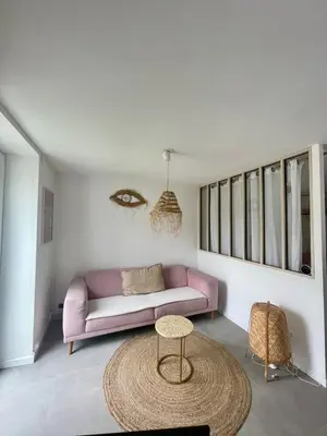 Coin salon dans l'établissement Casa Del Sol - T2 au Cœur du BassinPort Teich 5'