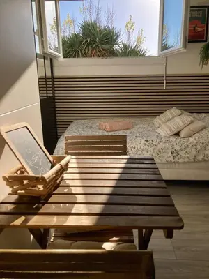 Coin salon dans l'établissement La Gravière, Cozy Studio Wifi & Parking 20M Océan Surf Plage