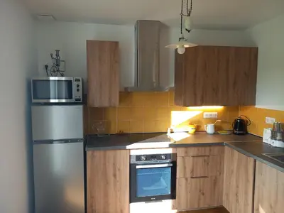 Cuisine ou kitchenette dans l'établissement La chalossaise