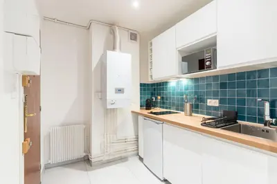 Cuisine ou kitchenette dans l'établissement Le Cocon, Dax, Studio cœur de ville