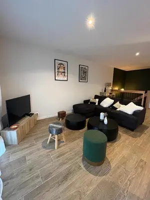 Télévision ou salle de divertissement dans l'établissement Vue Mer - Au Coeur de Contis Plage